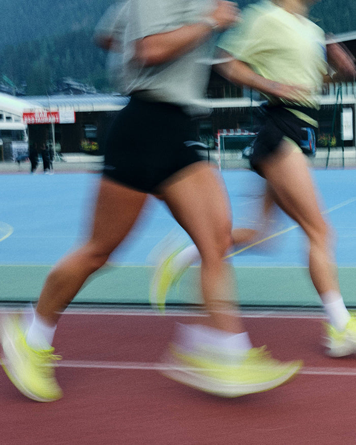 Women running on a track