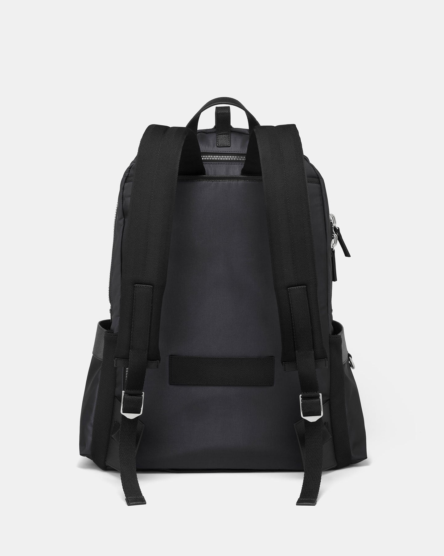 Black backpack on a light gray background