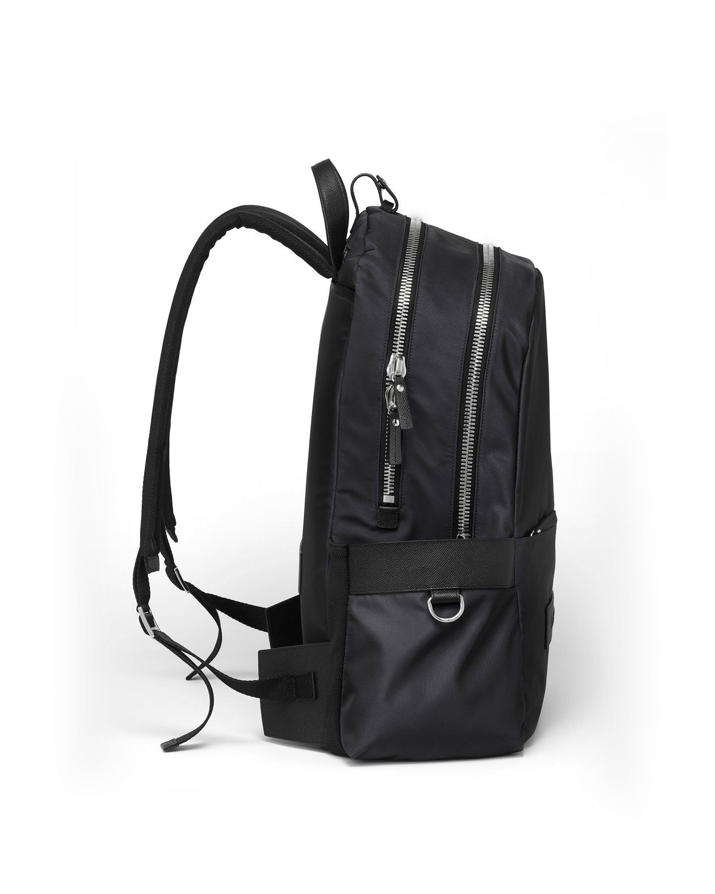 Black backpack with zippers on a white background