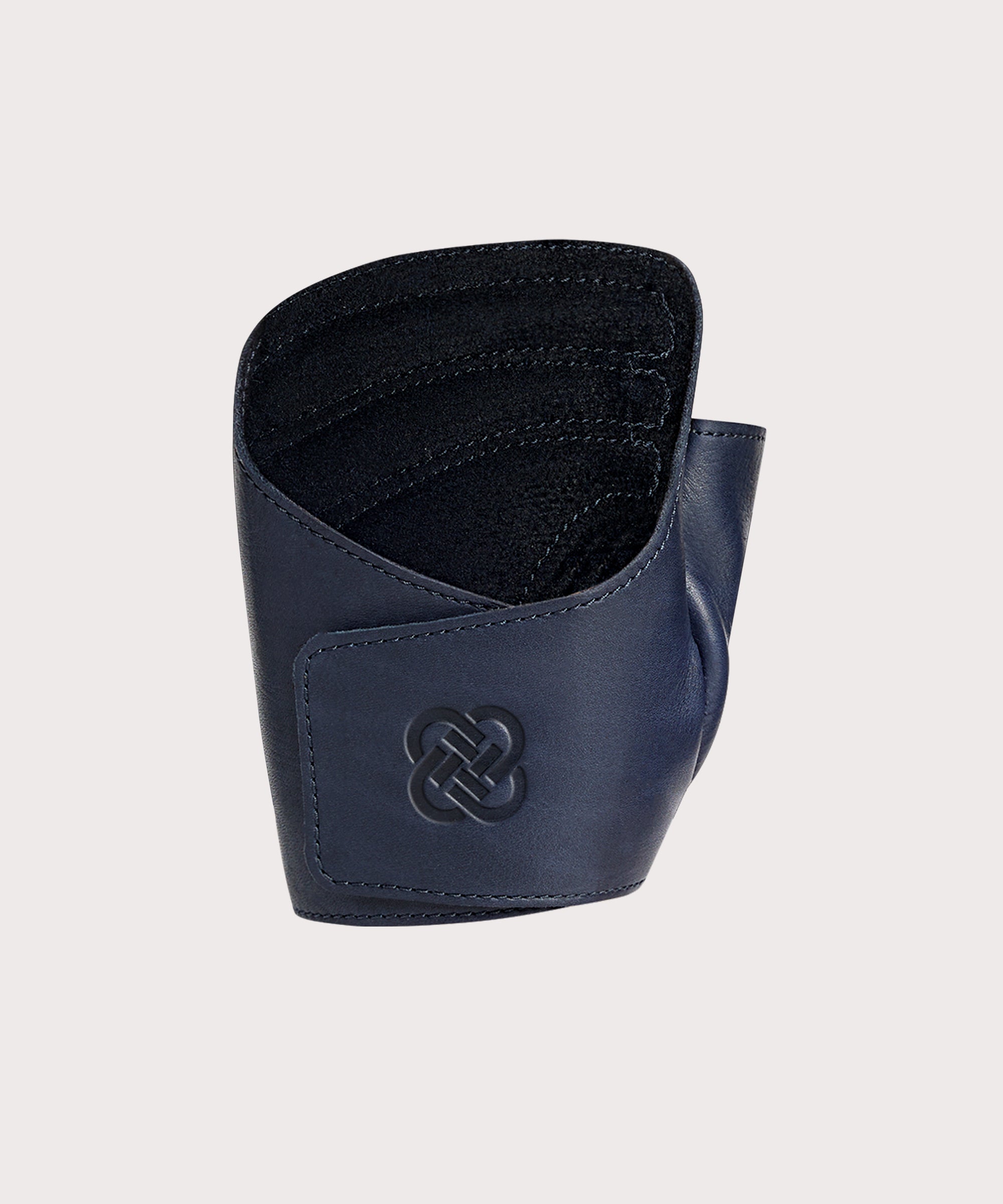 One singular "The Wrap" navy colored leather weight lifting glove