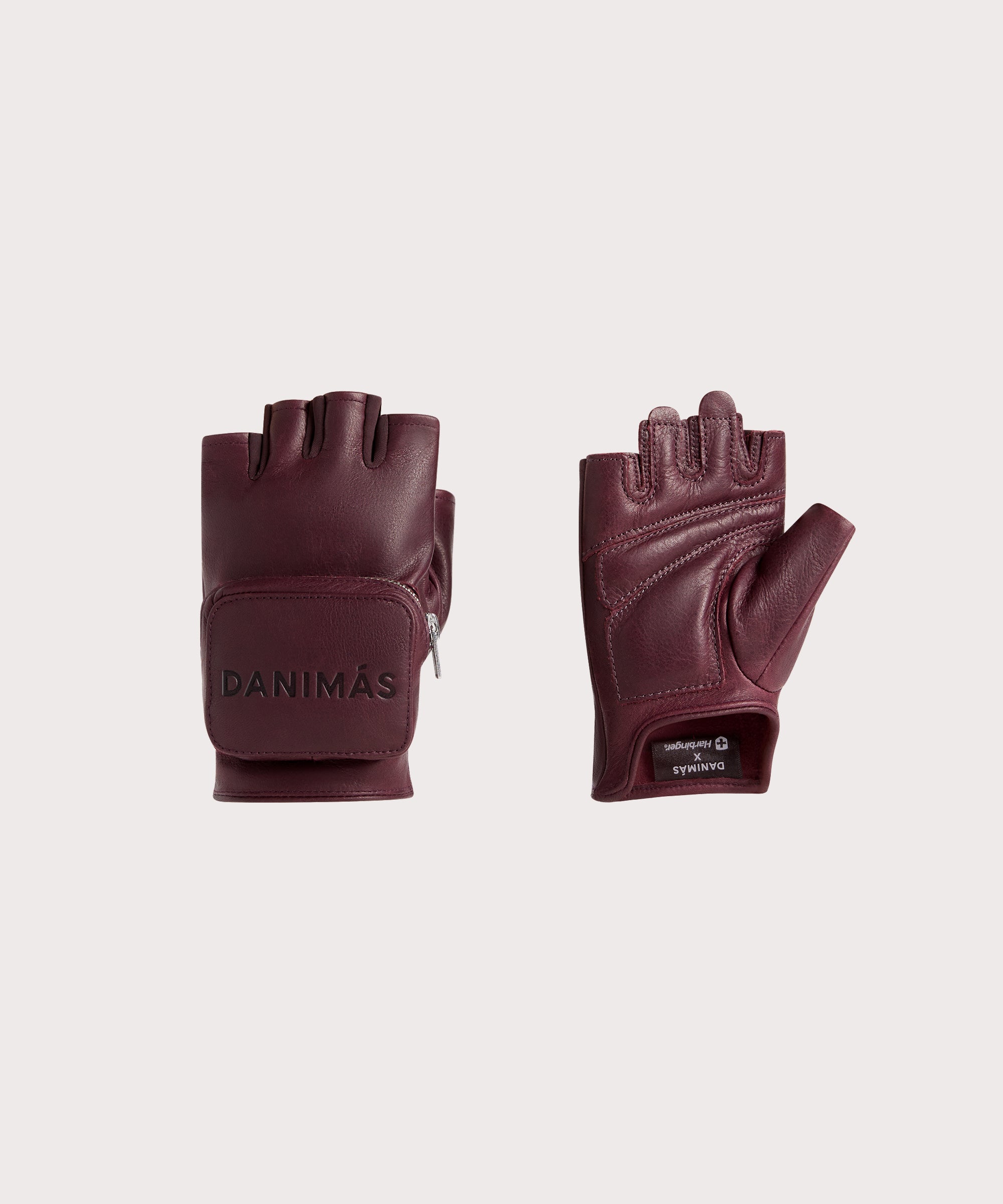 Pair of burgundy "Conceal" weight lifting gloves with "Danimas" logo