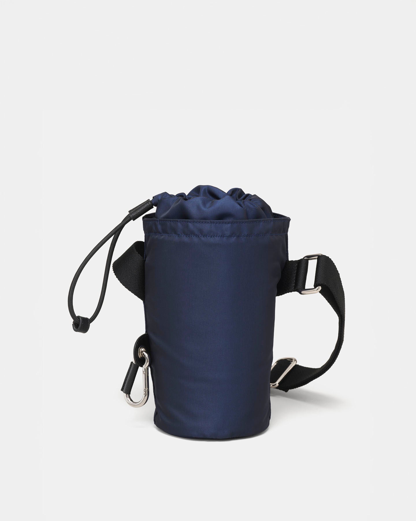 Navy blue crossbody water bottle bag with straps on a light gray background